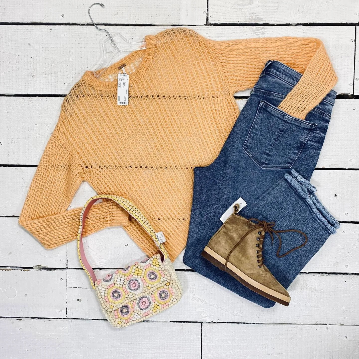 Free People Sweater Size S, $22.99
Democracy Jeans Size 14, $25.99
Purse, $14.99
Jenni Kayne Ankle Boot Size 6.5, $145.99