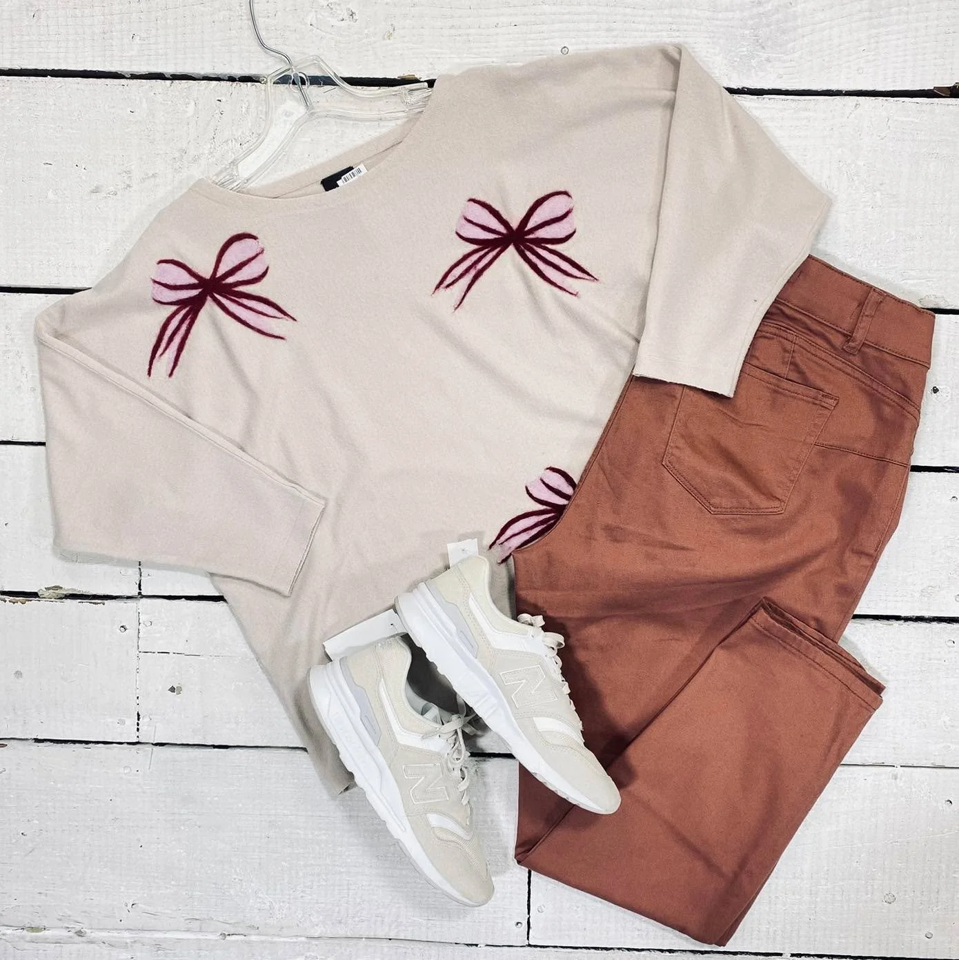 Aaeda Top Size XL, $11.99
Tribal Pants Size 16, $14.99
New Balance Tennis Size 8.5, $36.99