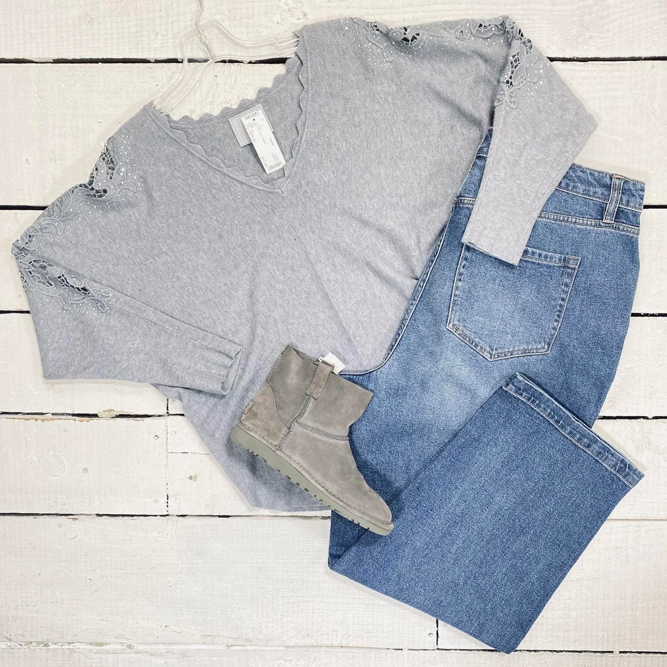 Liv Top Size XL, $17.99
Lane Bryant Jeans Size 16, $27.99
Ugg Ankle Boot Size 7, $65.99