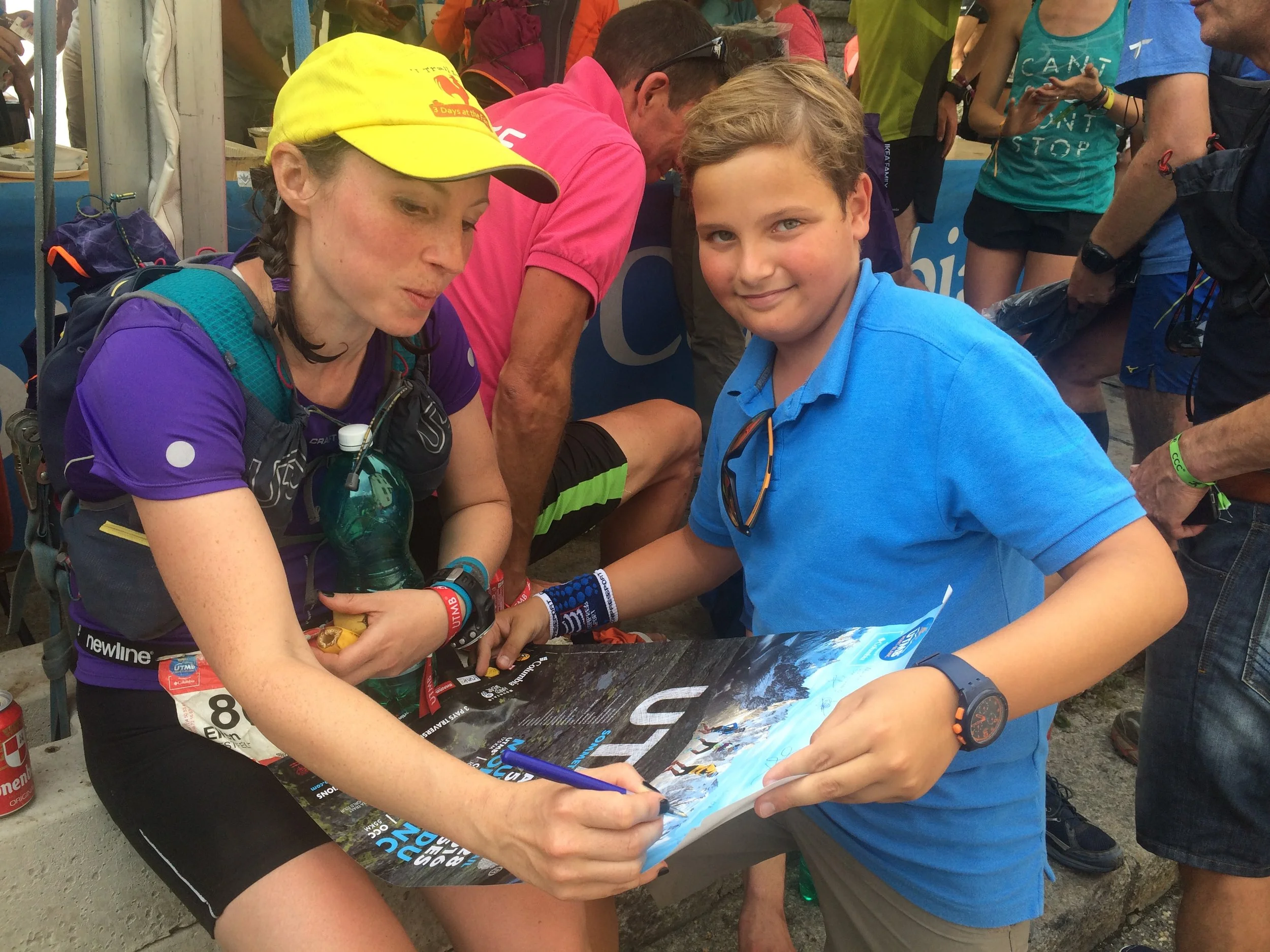 Writing autographs at the finish. What a moment!