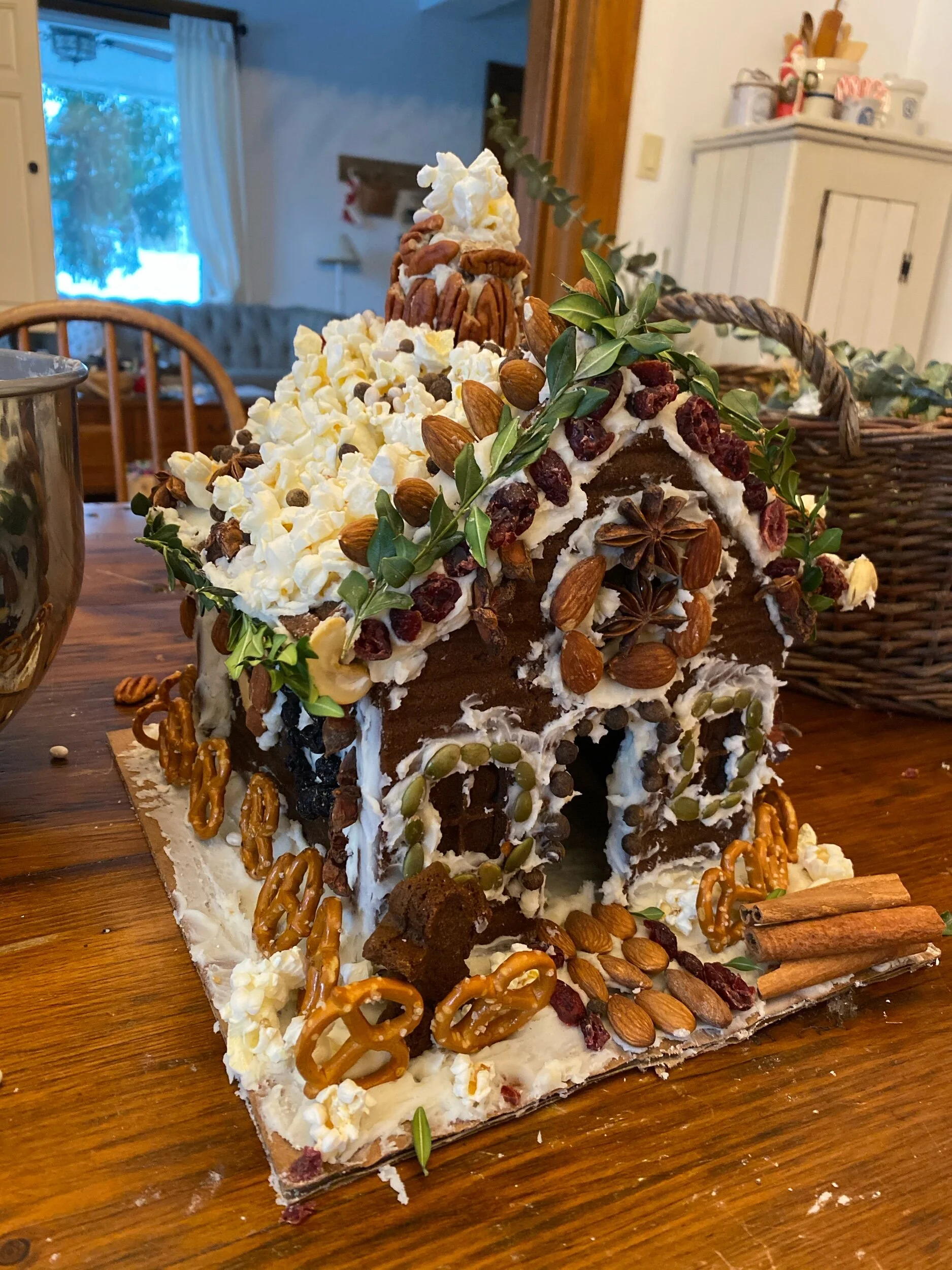 A Natural Gingerbread House Under A Tin Roof Decorate the outside of the house using gingerbread men or trees or cinnamon sticks to look like wood. a natural gingerbread house under a