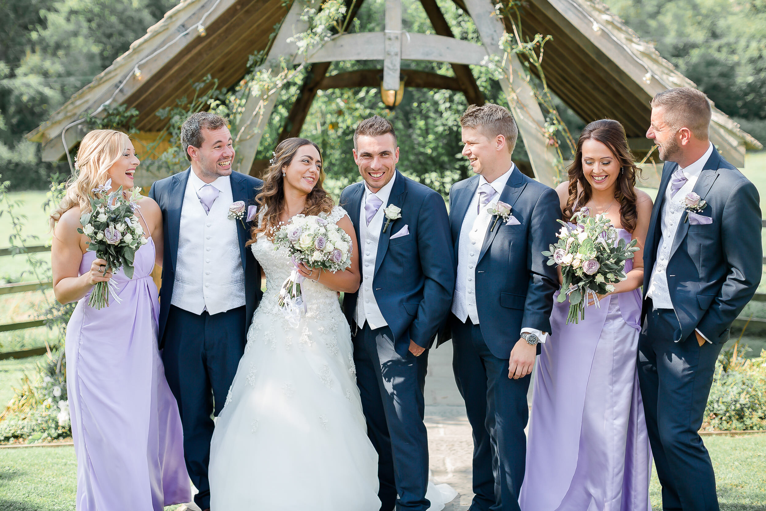 bridal-party-natural-group-shot-hyde-house-cotswolds.jpg