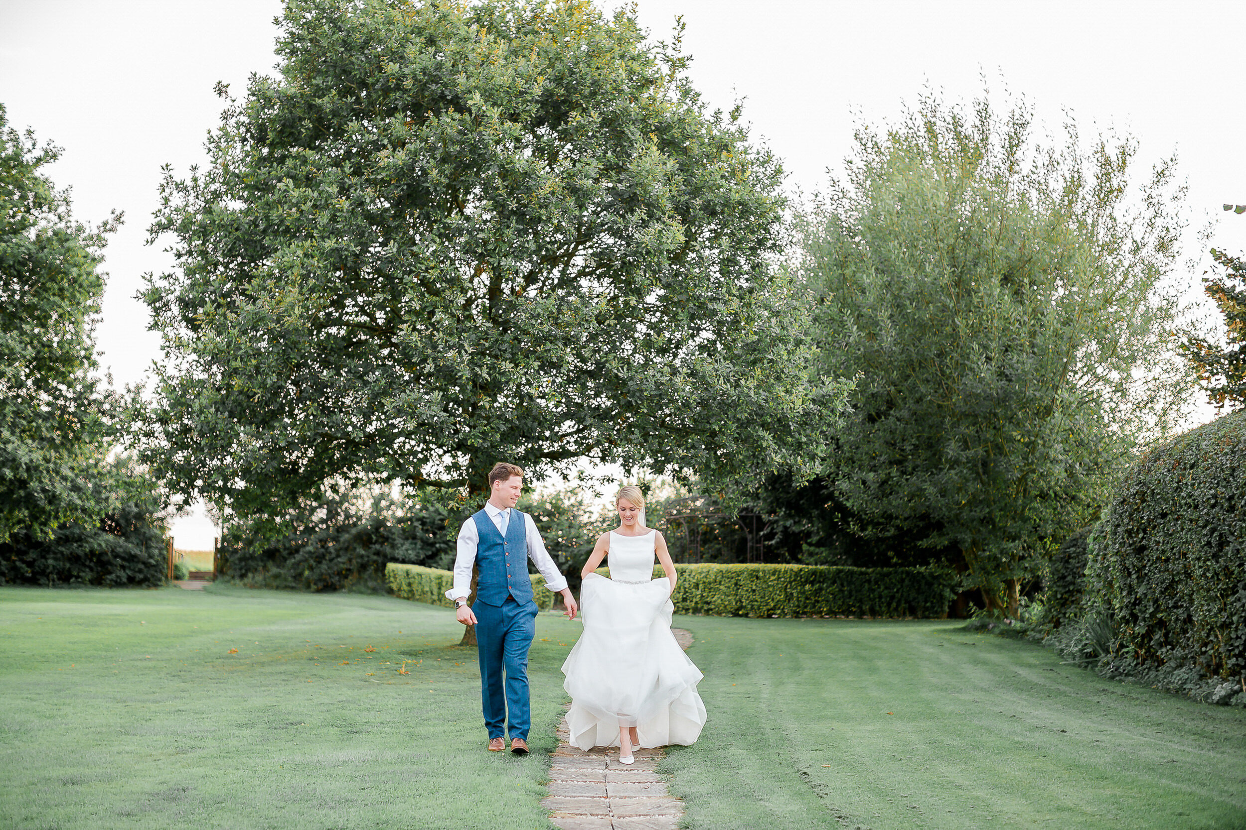 bride-groom-natural-walking-wethele-manor-leamington-spa.jpg
