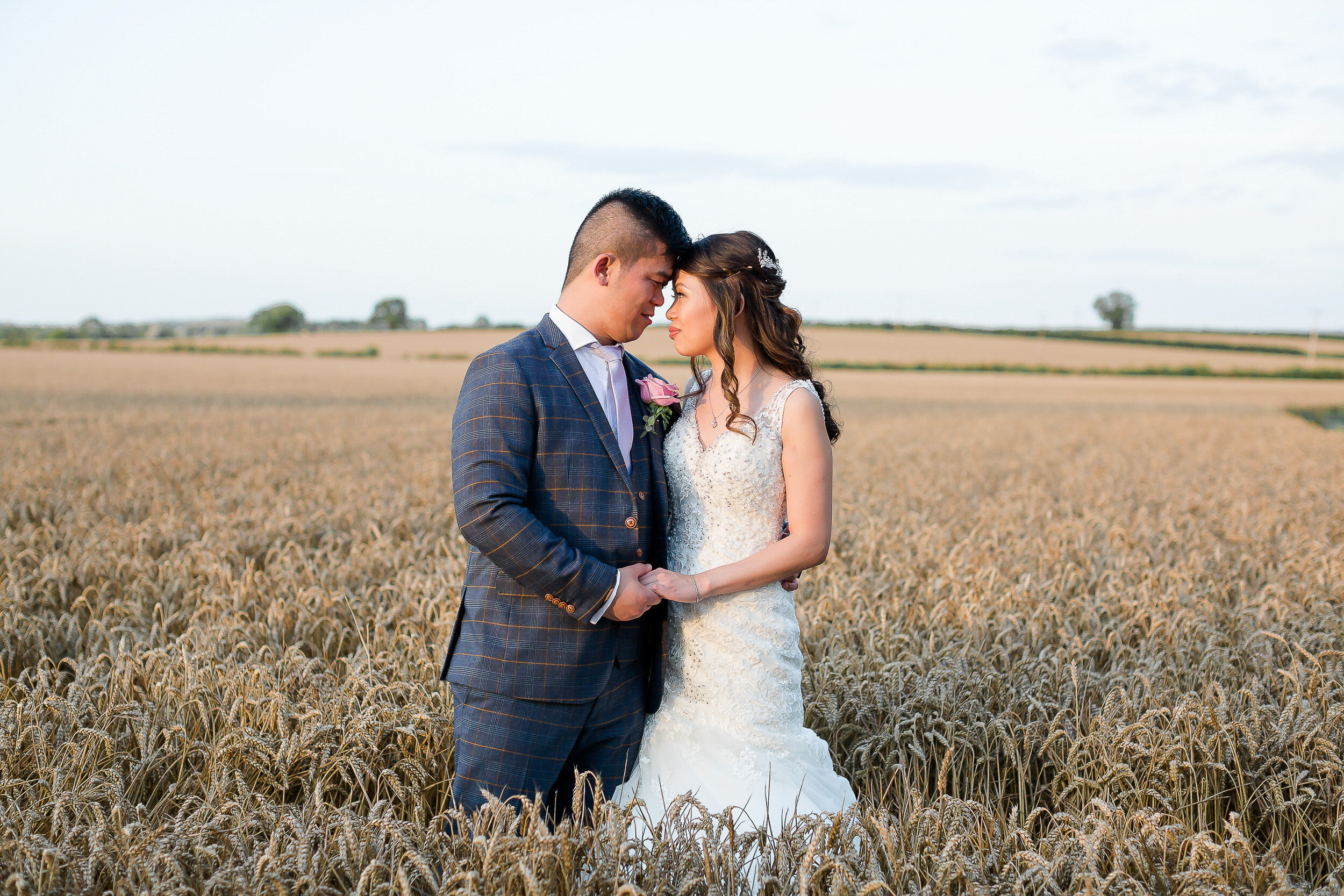 bride-groom-sunset-cornfield-blackwell-grange-cotswolds.jpg