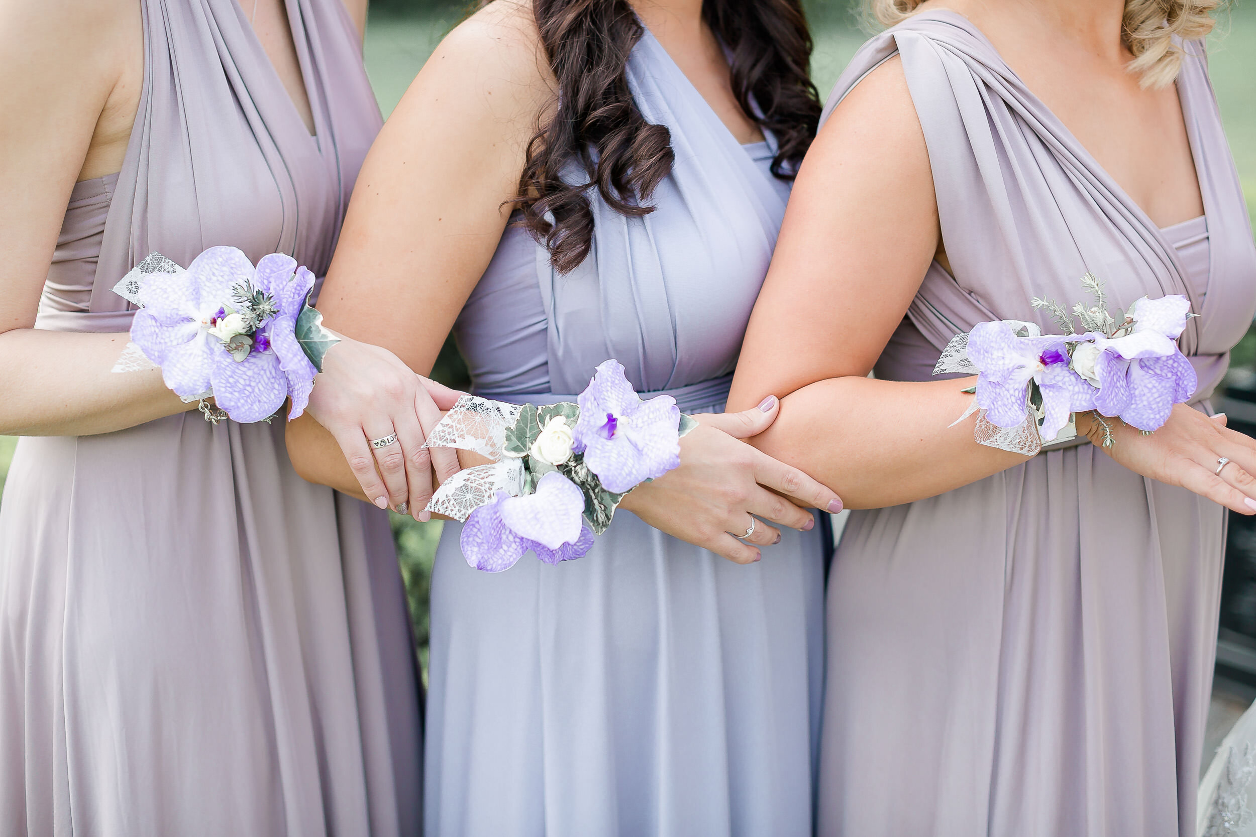 bridesmaids-wrist-corsage-purple.jpg