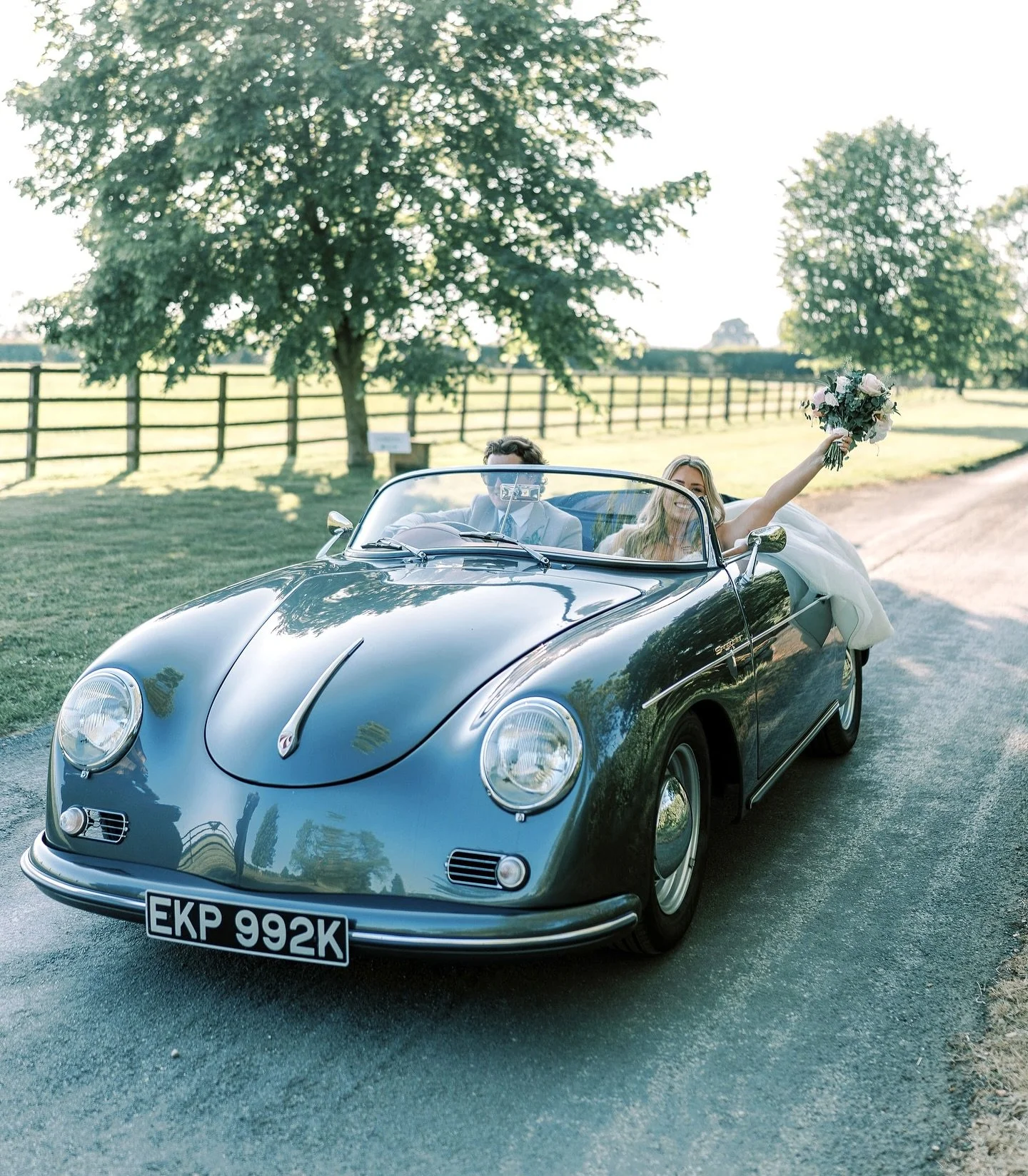 Driving off as Husband &amp; Wife, vintage style of course! Larissa &amp; Dans perfect get away moments @norton_grounds #vintageweddingcar