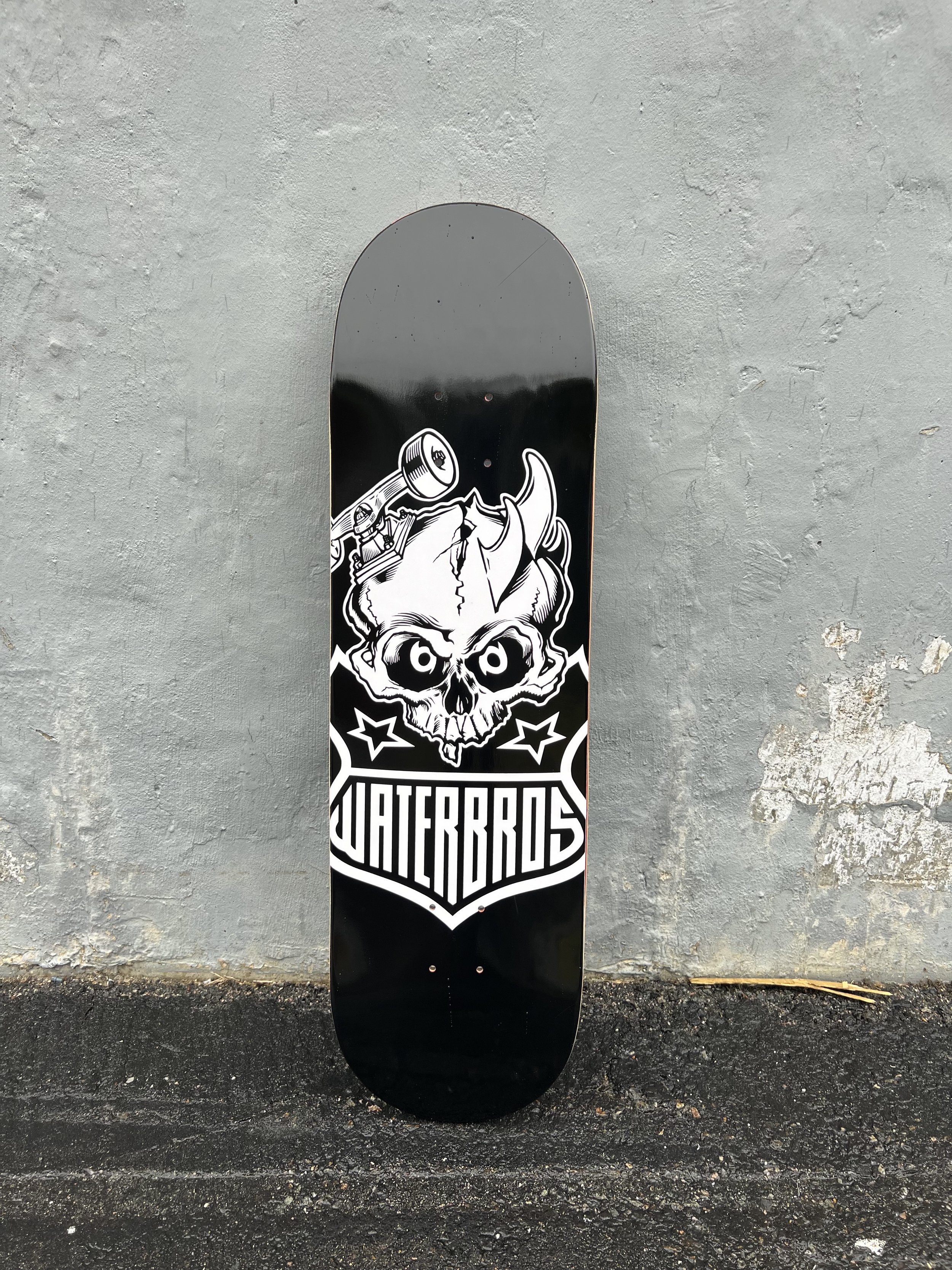surf skate skull deck.jpg