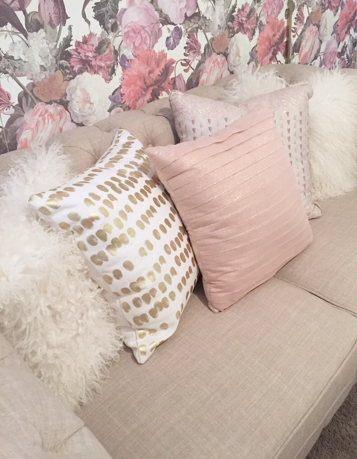 Assorted pillows make the settee the perfect place to sit.