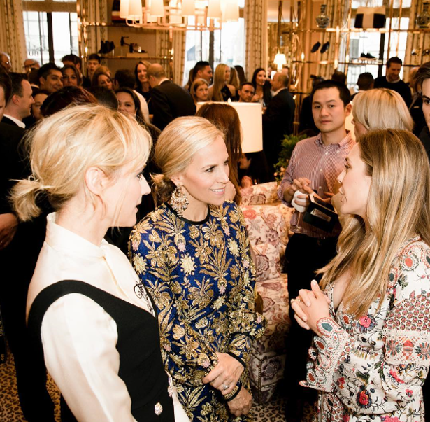 Tory Burch with guests at her London opening