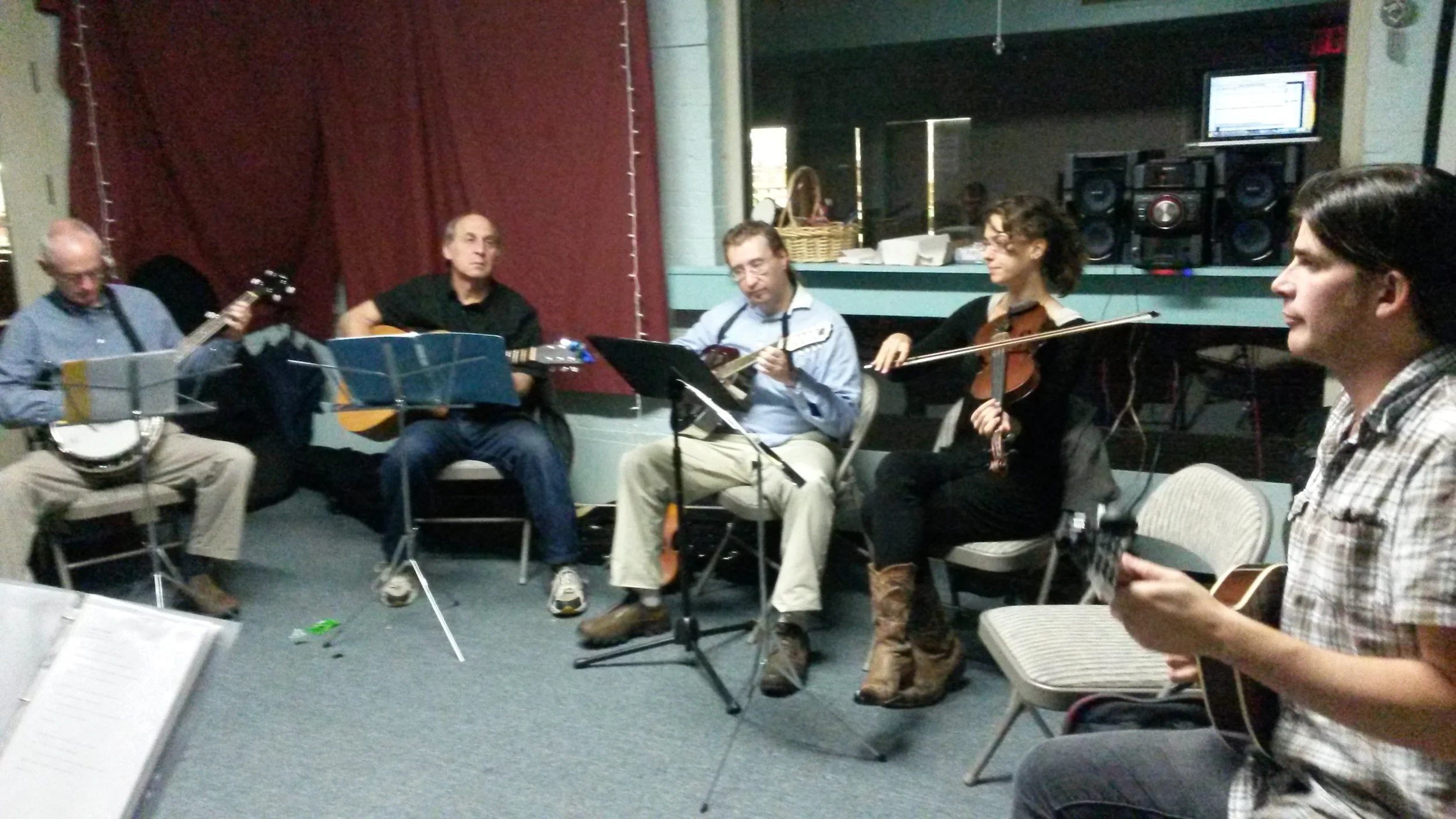 Leading an ensemble at the Passim School of Music in Cambridge, MA. Photo Credit: Hannah Baker