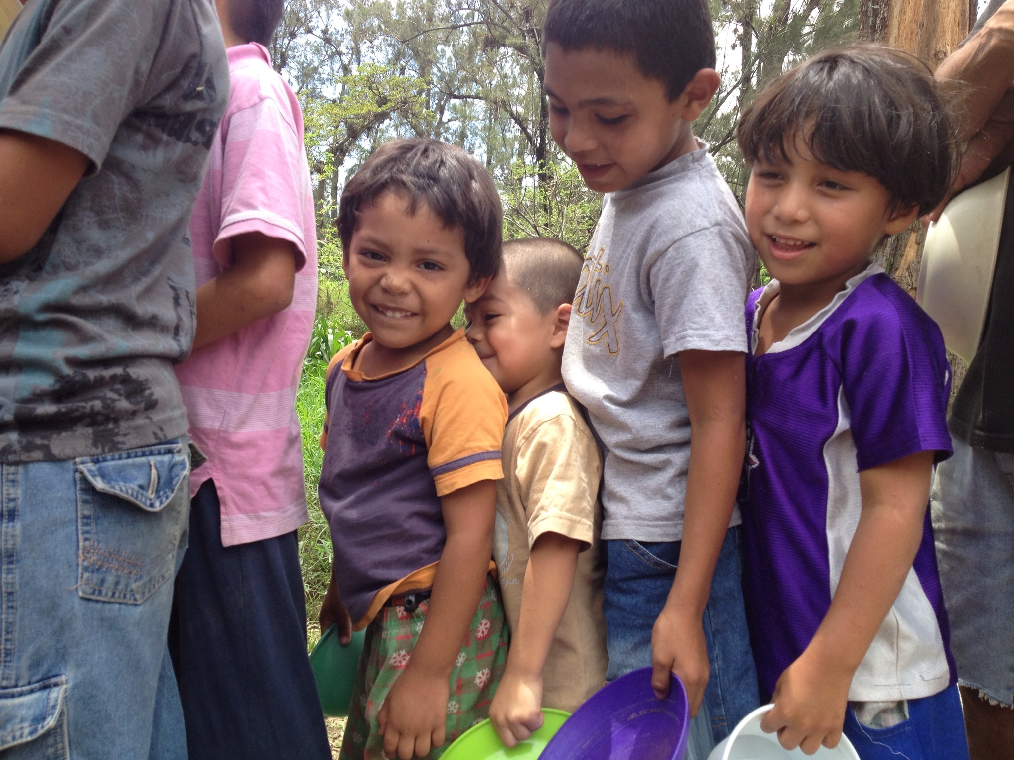 Kids lining up for a feeding center. 