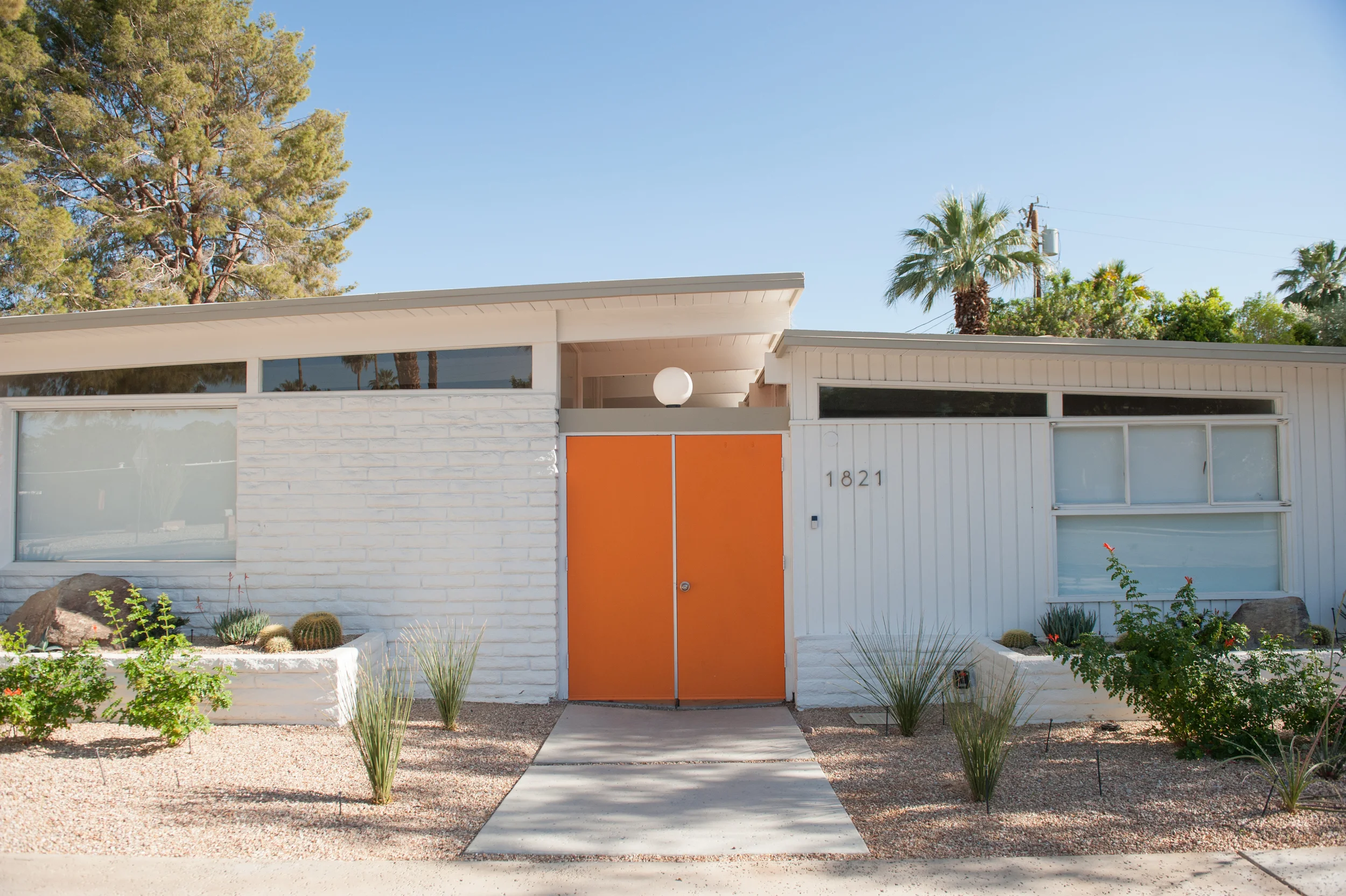 Orange doors welcome you in at The Amado. I mage courtesy of Melissa Gidney. 