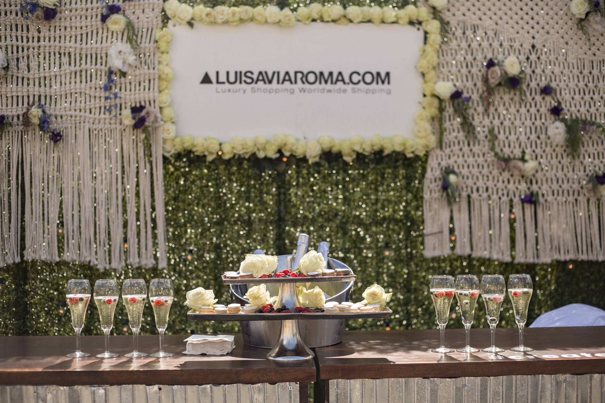 Roses courtesy of Passion Roses , macrames courtesy of Reform Fibers , sparkling wine courtesy of Le Grand Courtâge .