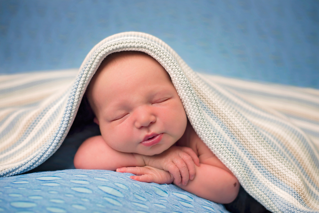 baby under a blanket