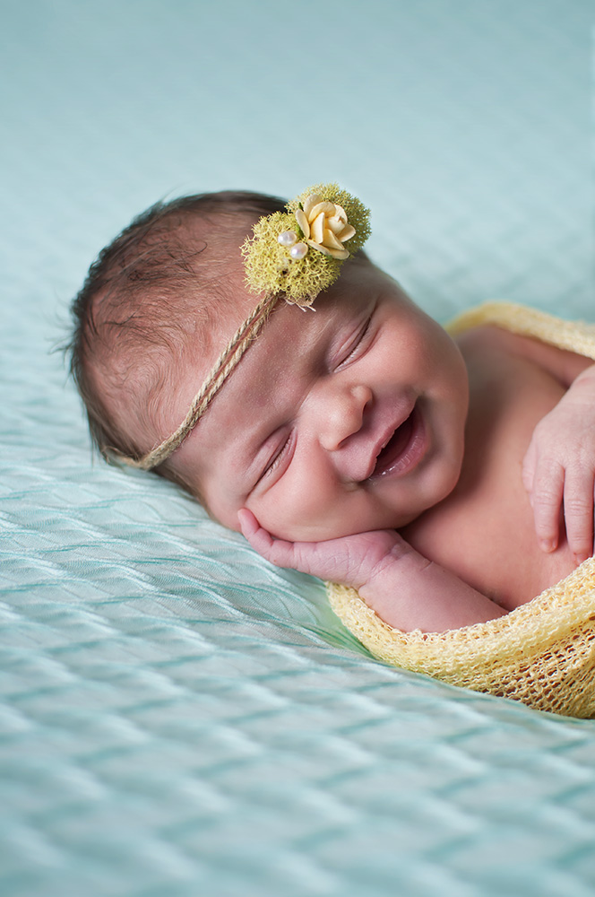 beautiful newborn smiling