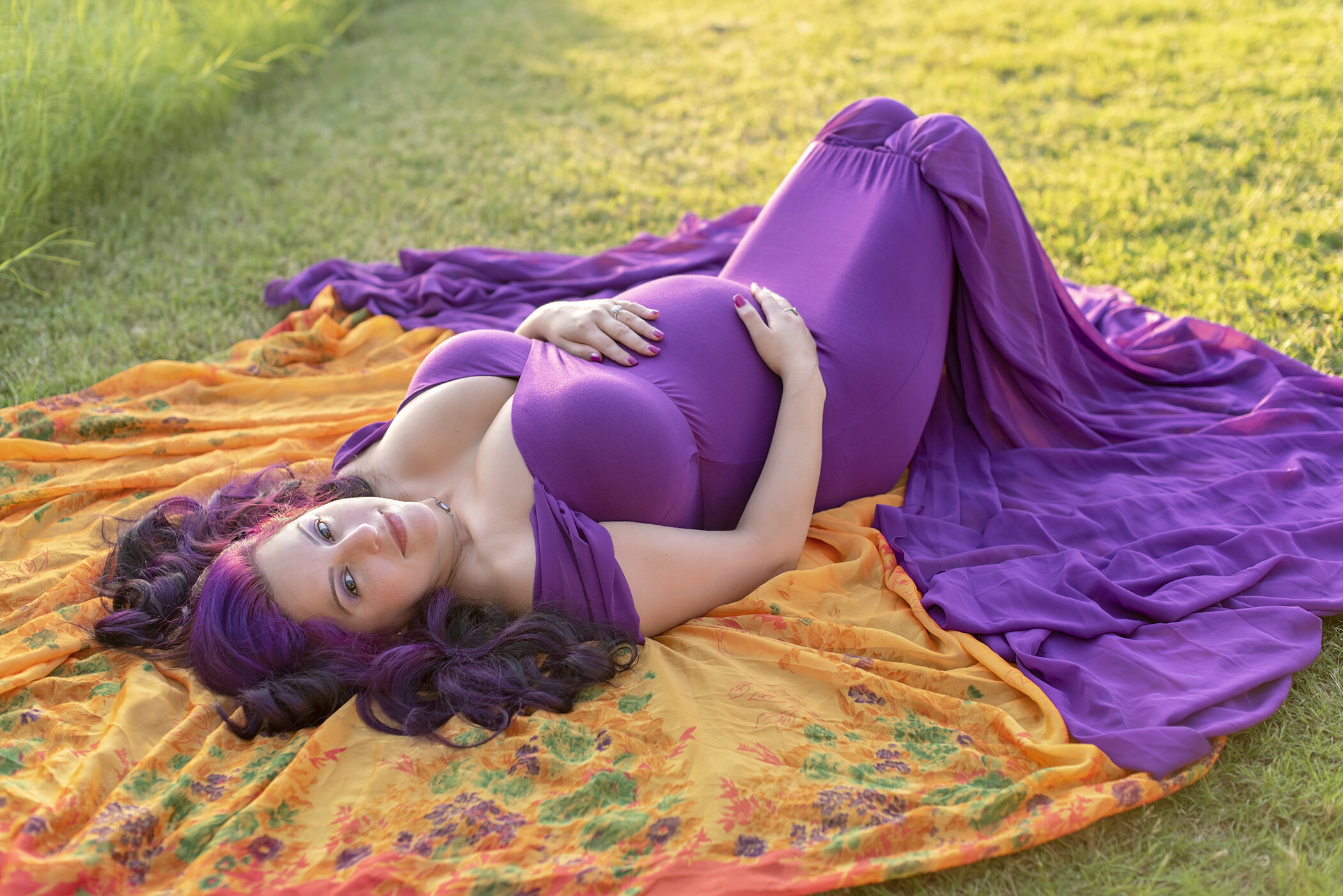 purple gown lying down pose