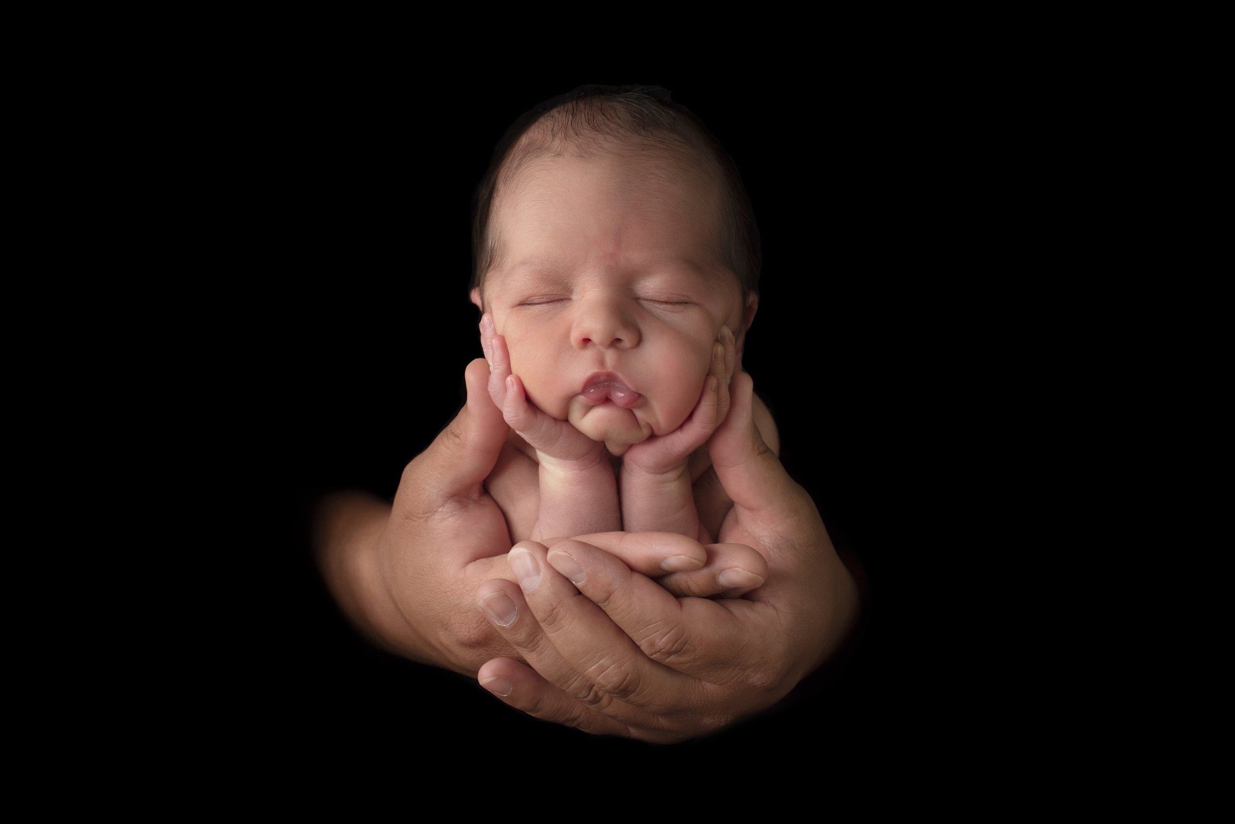 your life is in my hands newborn pose