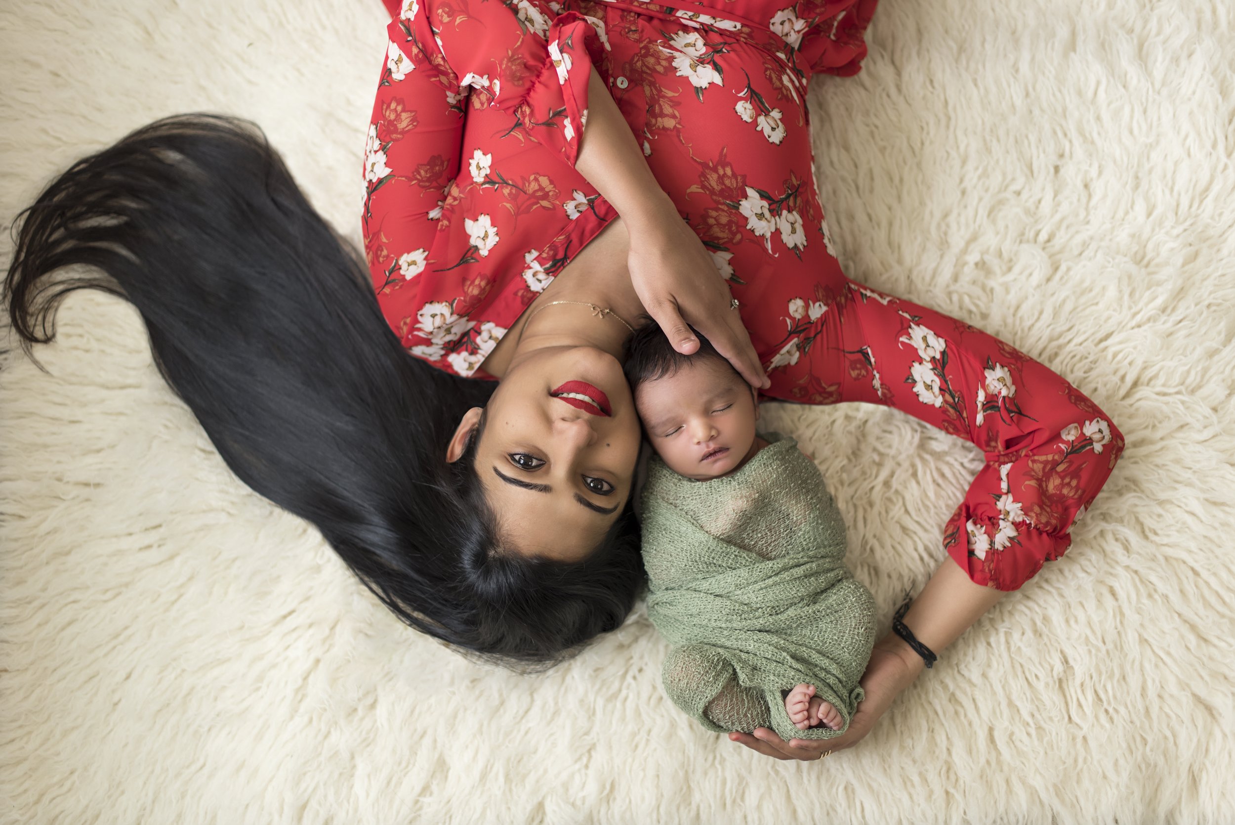 beautiful mommy and baby top down photos