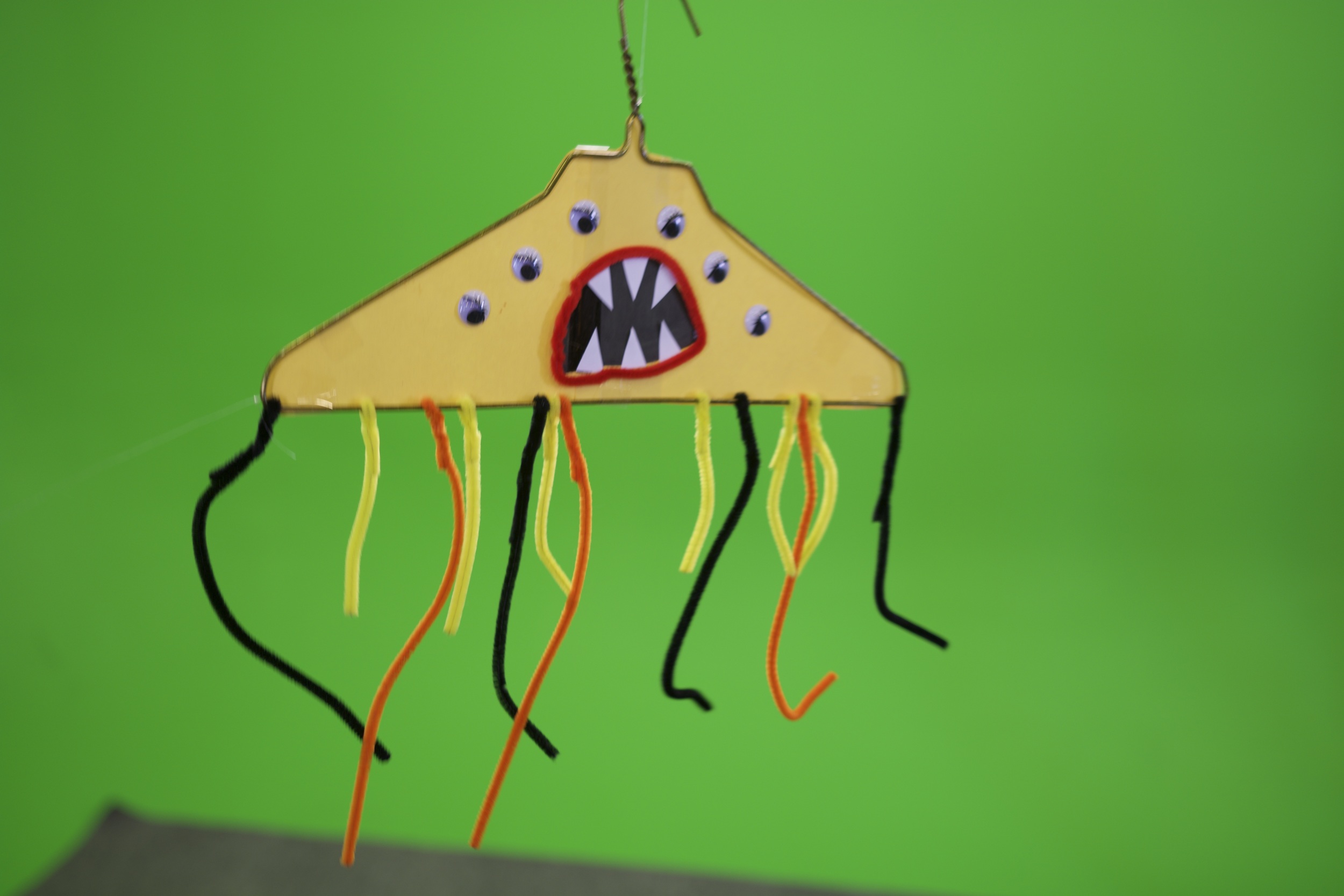 With "Cosmic Questers '97" we won our first “Best Use of Prop” award for our coat hanger monster! We affectionately call him "Coatie"!
