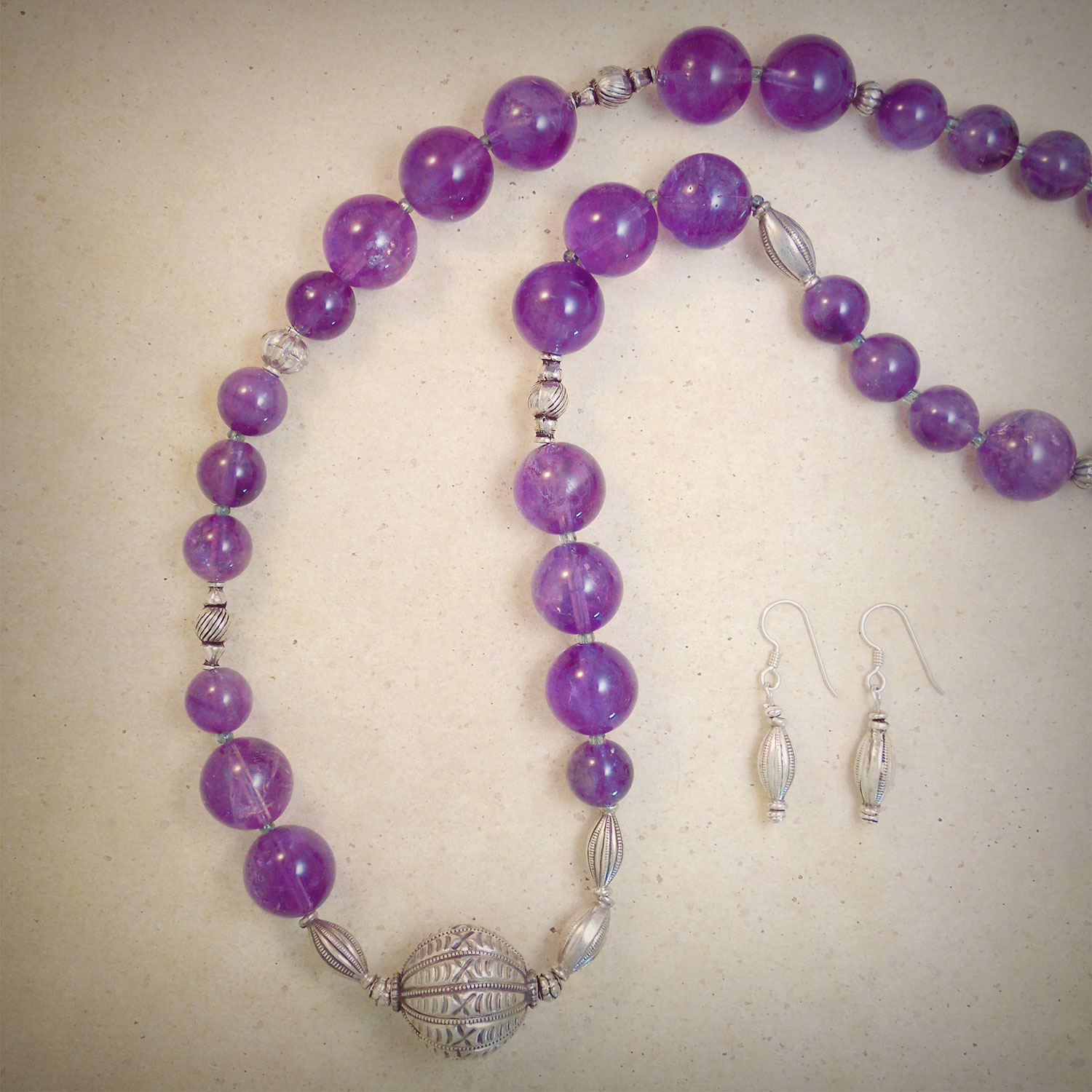 Asymetrical deep amethyst beaded necklace