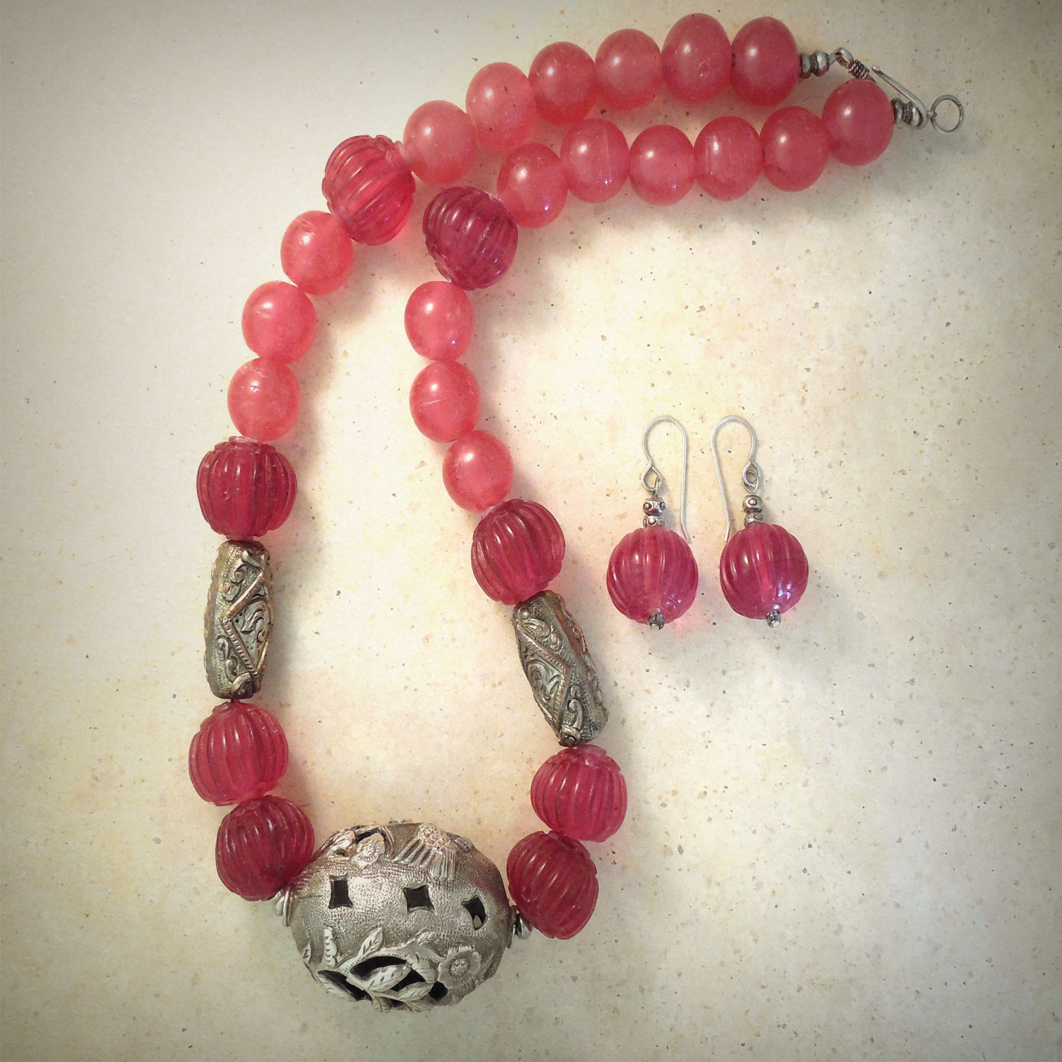 Peking rose glass beads with worked silver