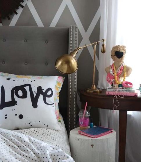 Smith's bedroom wall she created out of simple white tape laid out in a diamond pattern.
