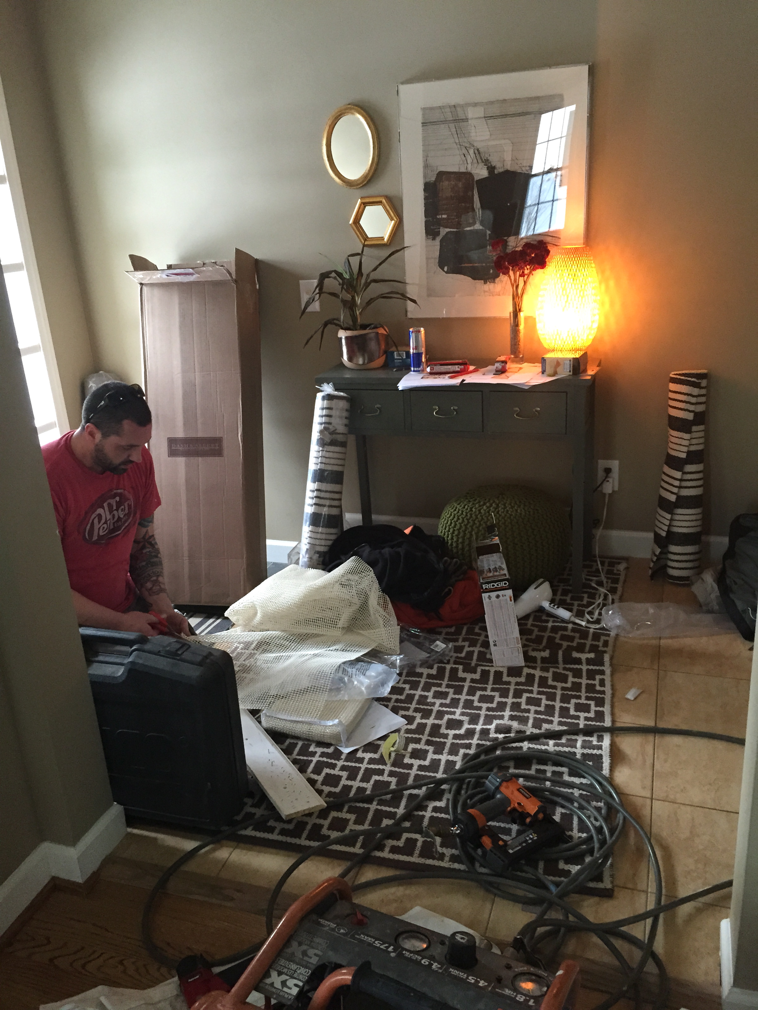 Cutting and prepping the rugs and pads.