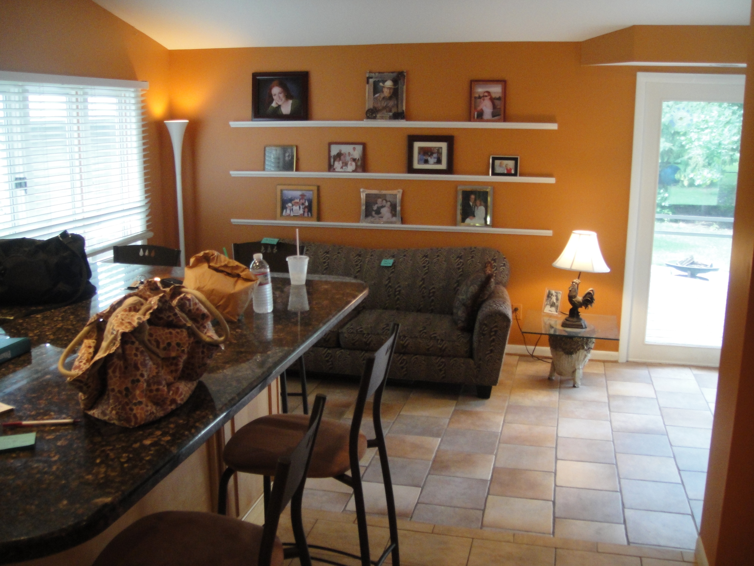 My home as furnished by previous home owners. Their other furniture was purple and leather. A nice compliment to the orange.