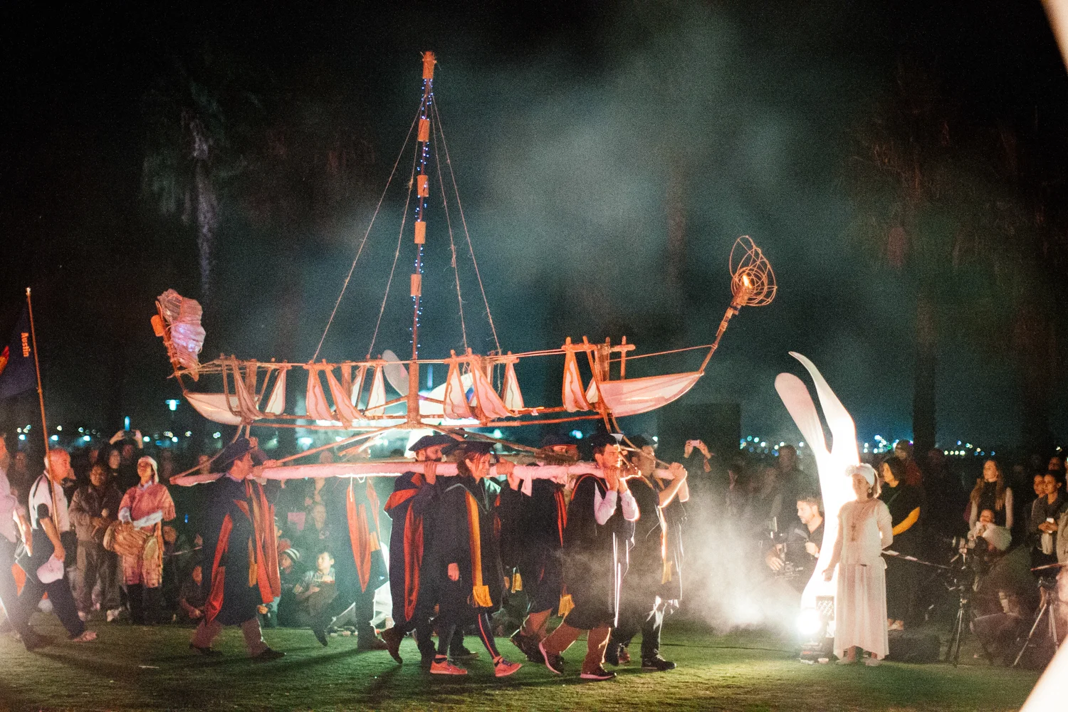 Deakin University academics arrive at Steampacket Gardens with Canoe for The Gathering of the City: Geelong Connected Communities ceremony.  Image by Dean Walters Photography.