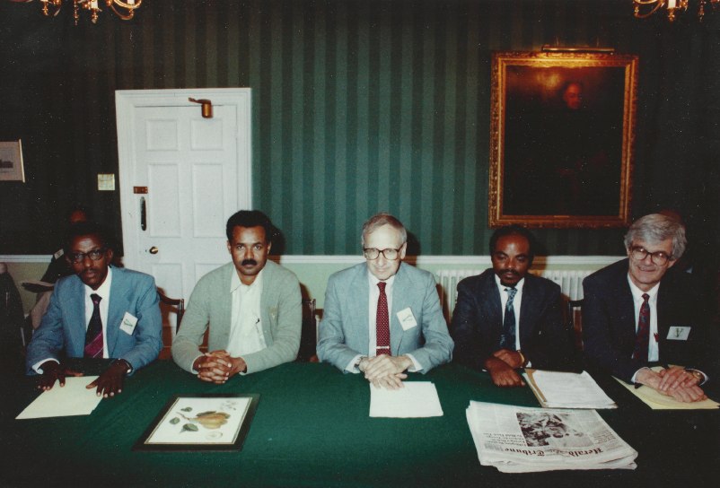  Ending the War for Eritrean Independence: London, England, May 31, 1991. On Cohen's left is Meles Zenawi, Prime Minister of Ethiopia. On Cohen's right is Isayas Afwerki, President of Eritrea. 