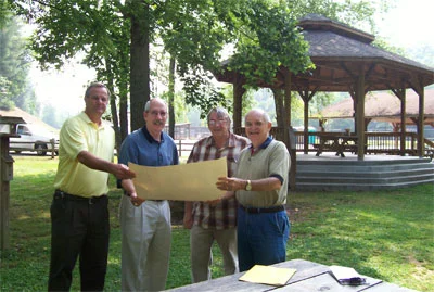 Larry Garrett, Lamar Paris, Mike Smith, and Gene Harrison at the Pavilion in Meeks Park