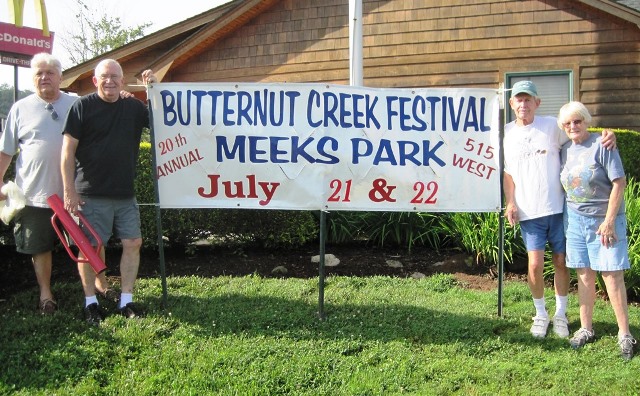  Putting up banners for 20th Annual Butternut Creek Festival. Duncan Sickler, Tom Chambers, Paul &amp; Helena Grossmann.  