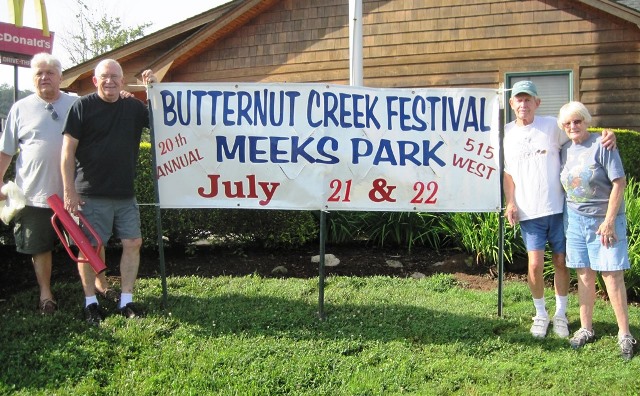 Putting up banners for 20th Annual Butternut Creek Festival. Duncan Sickler, Tom Chambers, Paul & Helena Grossmann.