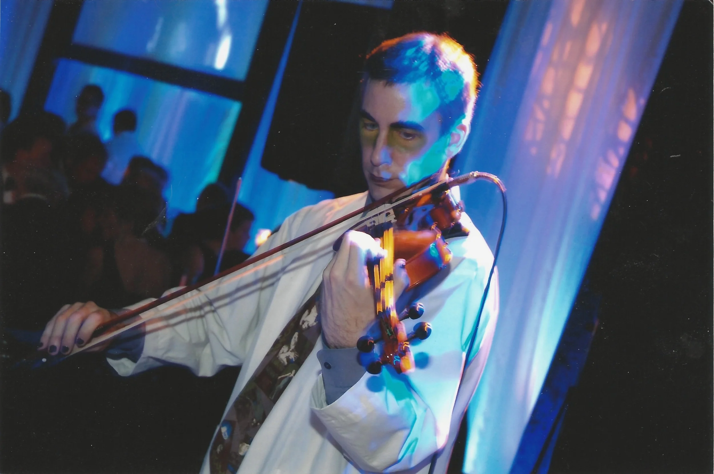 Richard Feren performing spooky dinner music at the AGO Shadow Ball in 2007.