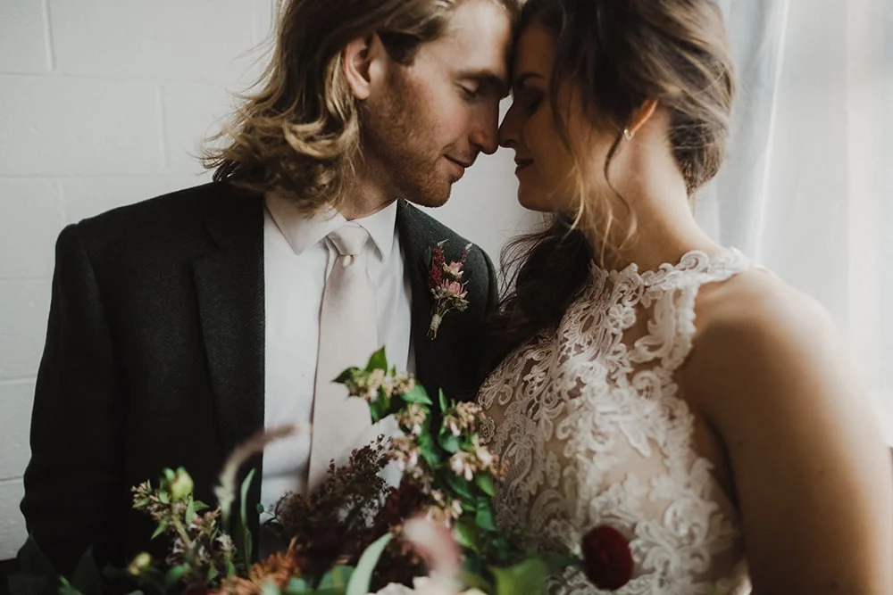 couple touching their noses together