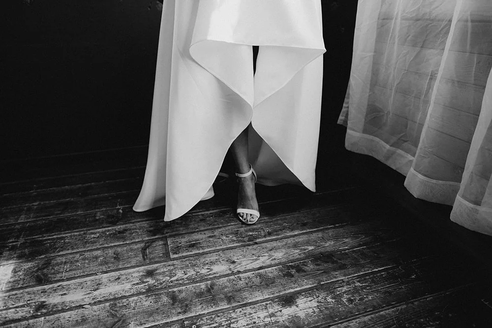 woman's shoes on wooden floor