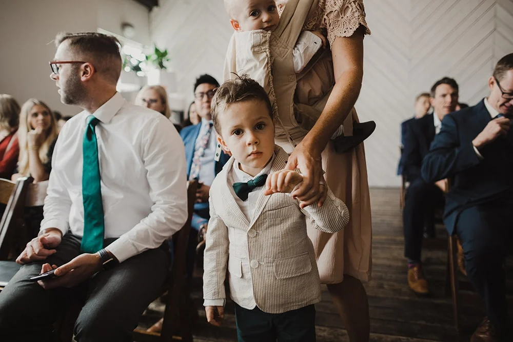 son looking at camera with sweet face
