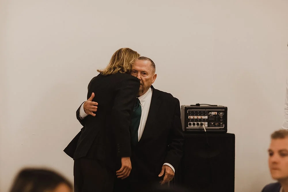 man hugging best friend