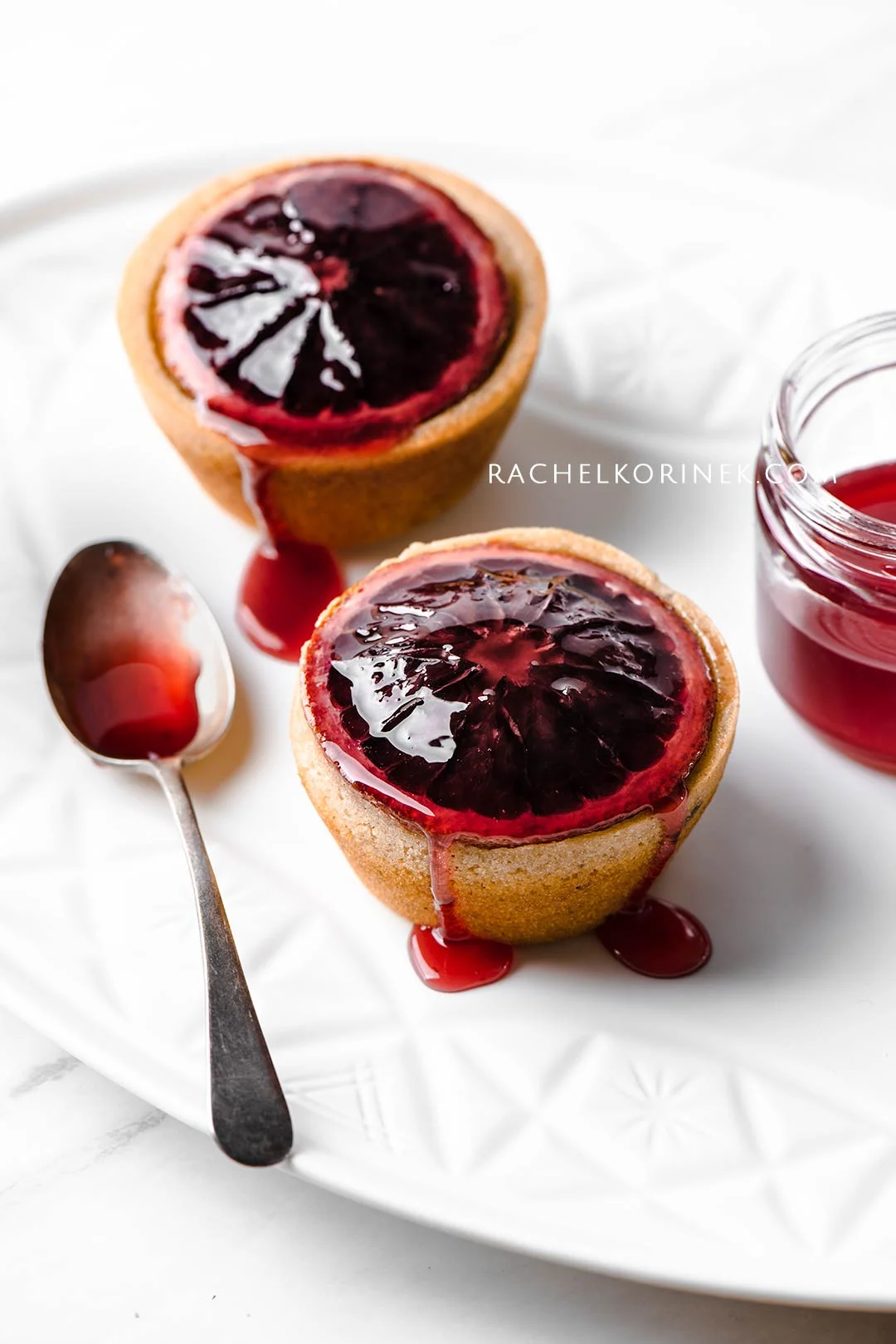 Rachel Korinek Food Photographer | Blood Orange Syrup Cakes Click to check out my latest food photography projects. #twolovesstudio #beautifulcuisine #foodbloggerpro #foodphotography #learnfoodphotography #foodblogger #learnphotography #foodstyling #lightingtips #naturallight #foodphotographer