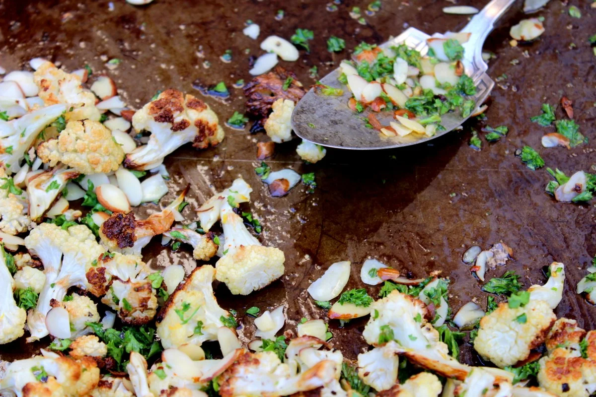 Roasted cauliflower w/ lemon, parsley & sliced almonds