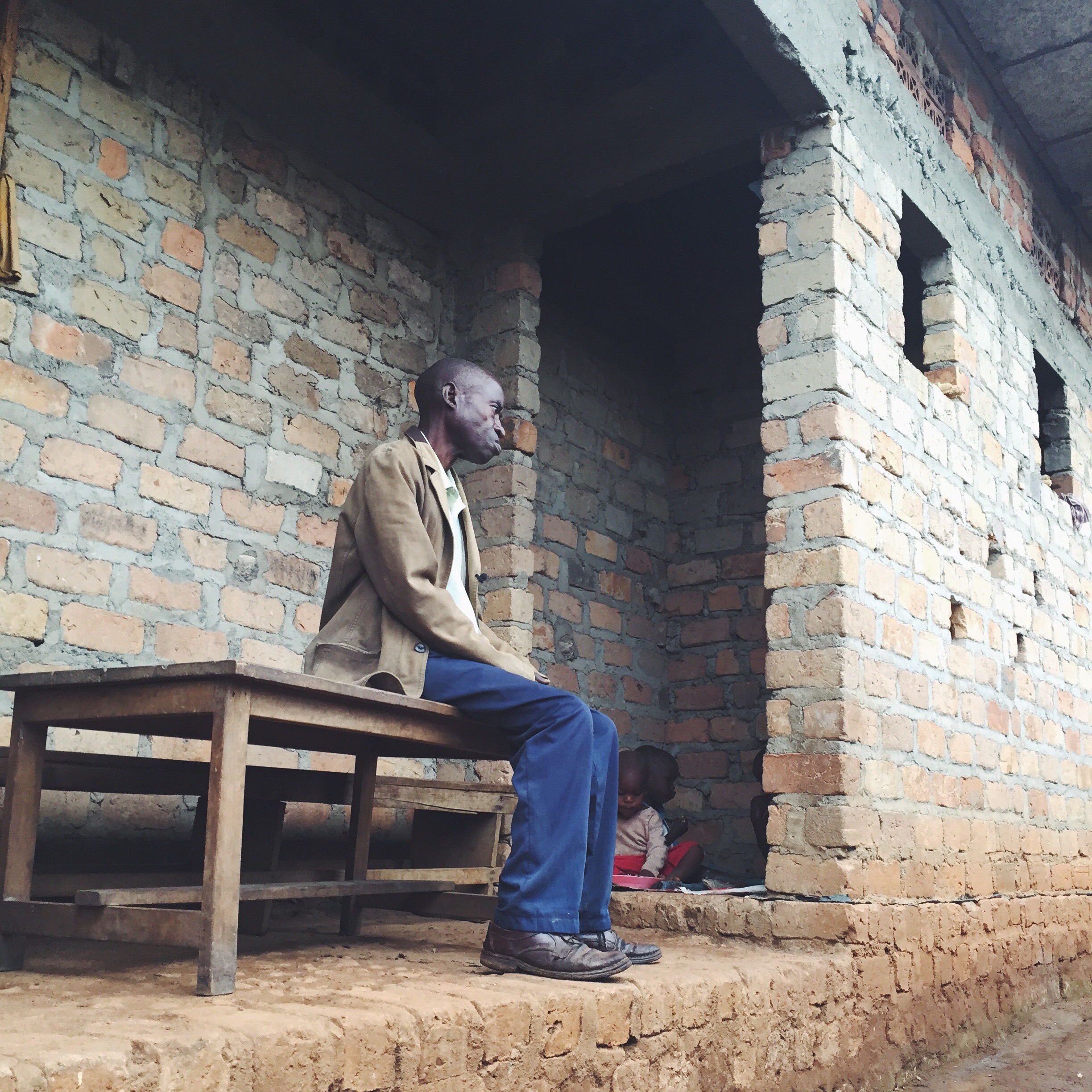  UGANDA: [Home Visit] Mr. Sentongo takes care of his 3 grandchildren living in an abandoned building. His daughter is on the streets and doesnt take care of them so he does. Mr. S was another instant hero. I wrote about him later that day on an insta