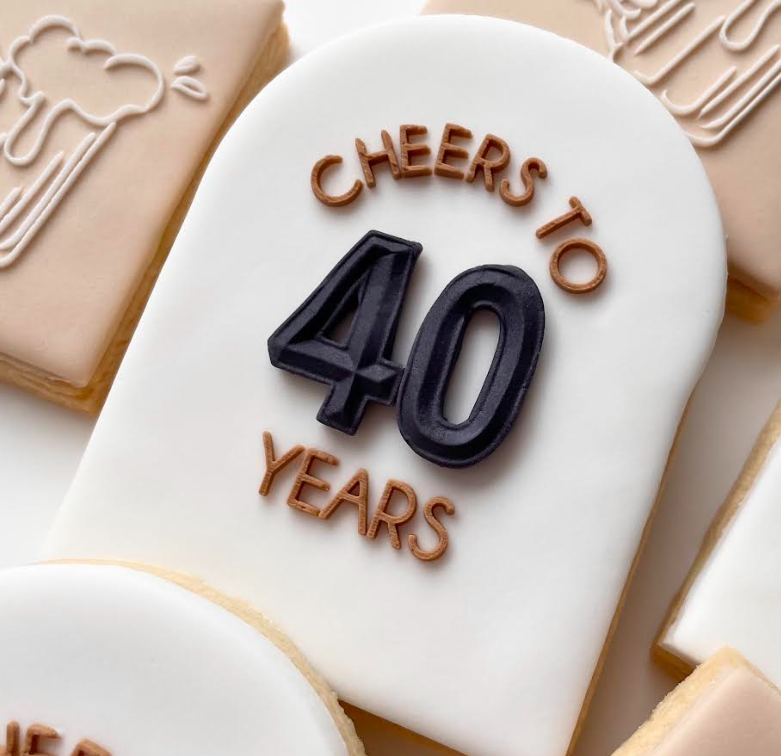 cheers-to-years-cookie-deboser.png