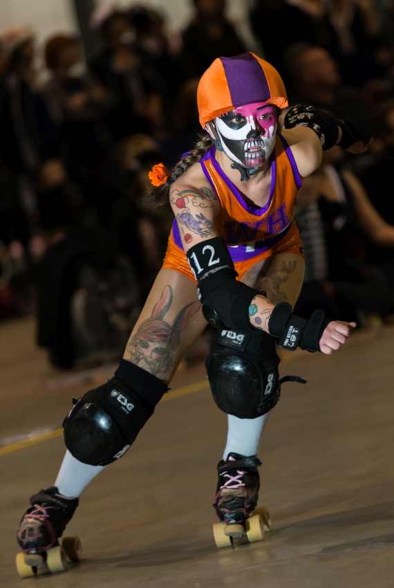 Pop-up Studio coverage at an indoor sporting event. This was a live action shot took at a rollerderby bouts. Our lighting separated the subject from the background. The objective here was to bring out the colours &amp; also direct our vision to this…