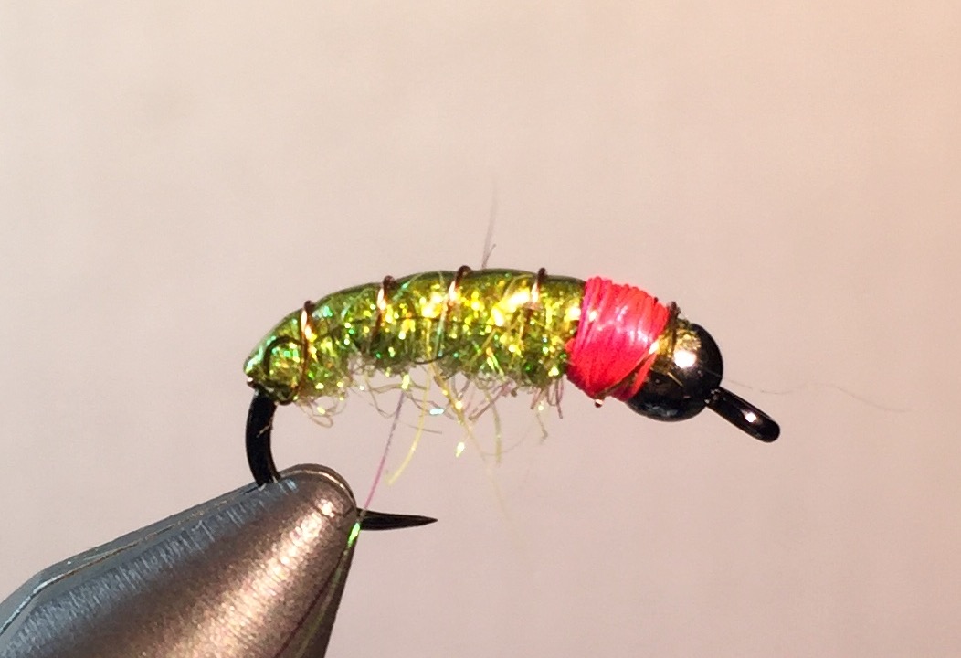 Step 7: Wrap pink thread several time until you have a nice 1 mm collar. Add pink antron dubbing if you wish for bulk. Whip finish and fish.