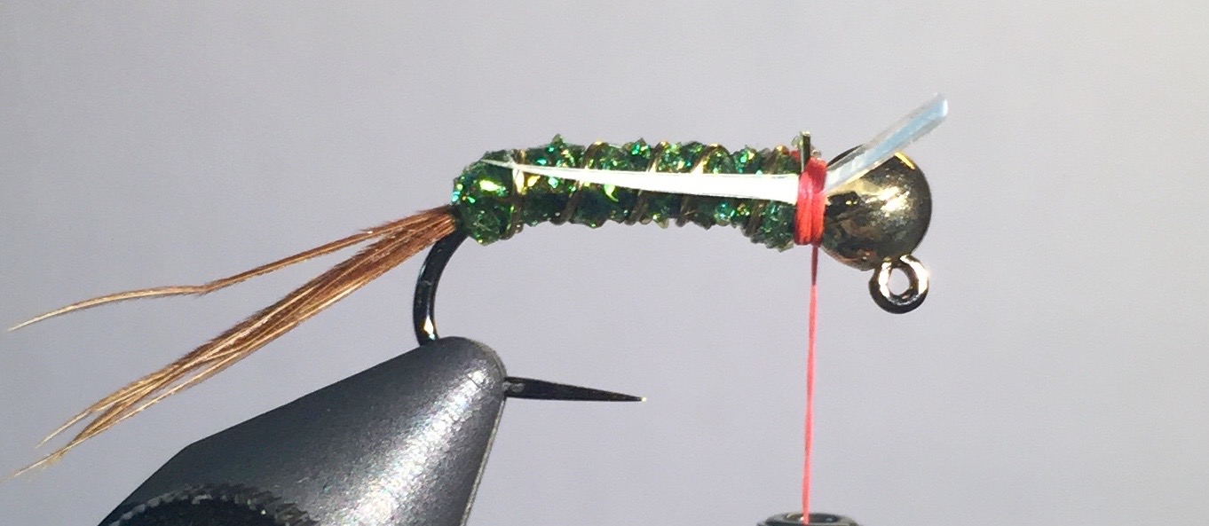 Step 6: Tie in goose biot on each side of the hook. 