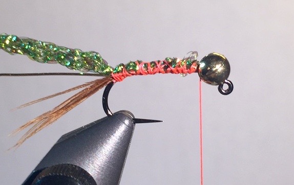 Step 3: Tie in a 2” section of medium gold wire, and a 2” section of green diamond braid.