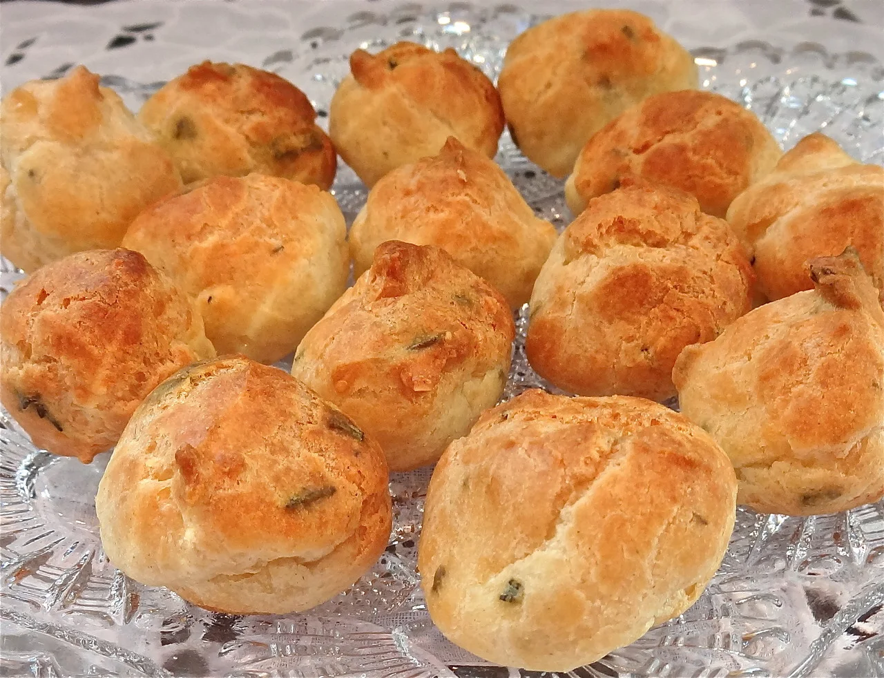 Gougeres are the easiest and also the hardest hors d’oeuvre to cook.I say that because they are easy to make once you get the knack. But I admit, they’re a little tricky for first-timers, so you need a few pointers. Which I am going to give you here…