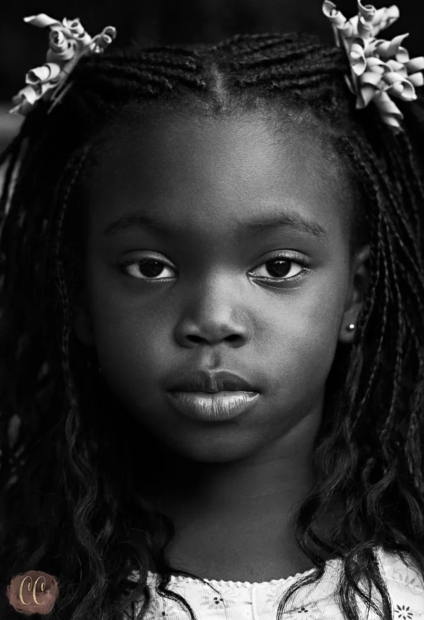 Black and white portrait of a child portrays innocence in Tampa Florida with Child photographer Carlie Chew Photography 