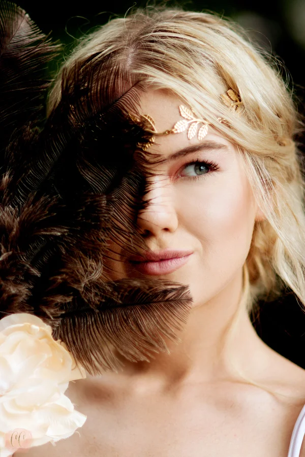 Beautiful glowing portrait of models face with gold crown taken by fashion photographer Carlie Chew Photography in Odessa, Florida 