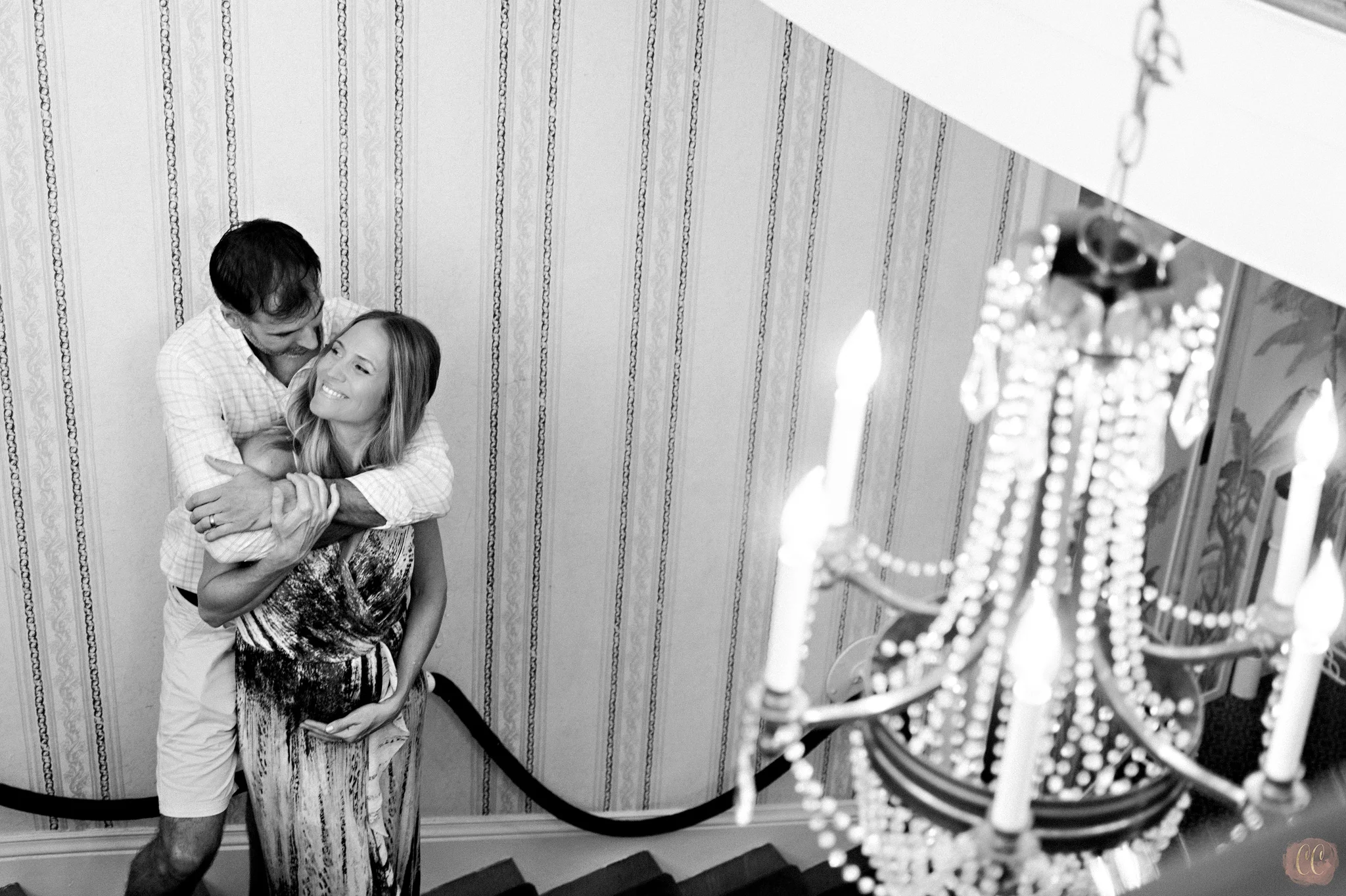 Maternity pictures taken of couple at The Tampa Yacht Club by Carlie Chew Photography at a gender reveal party 